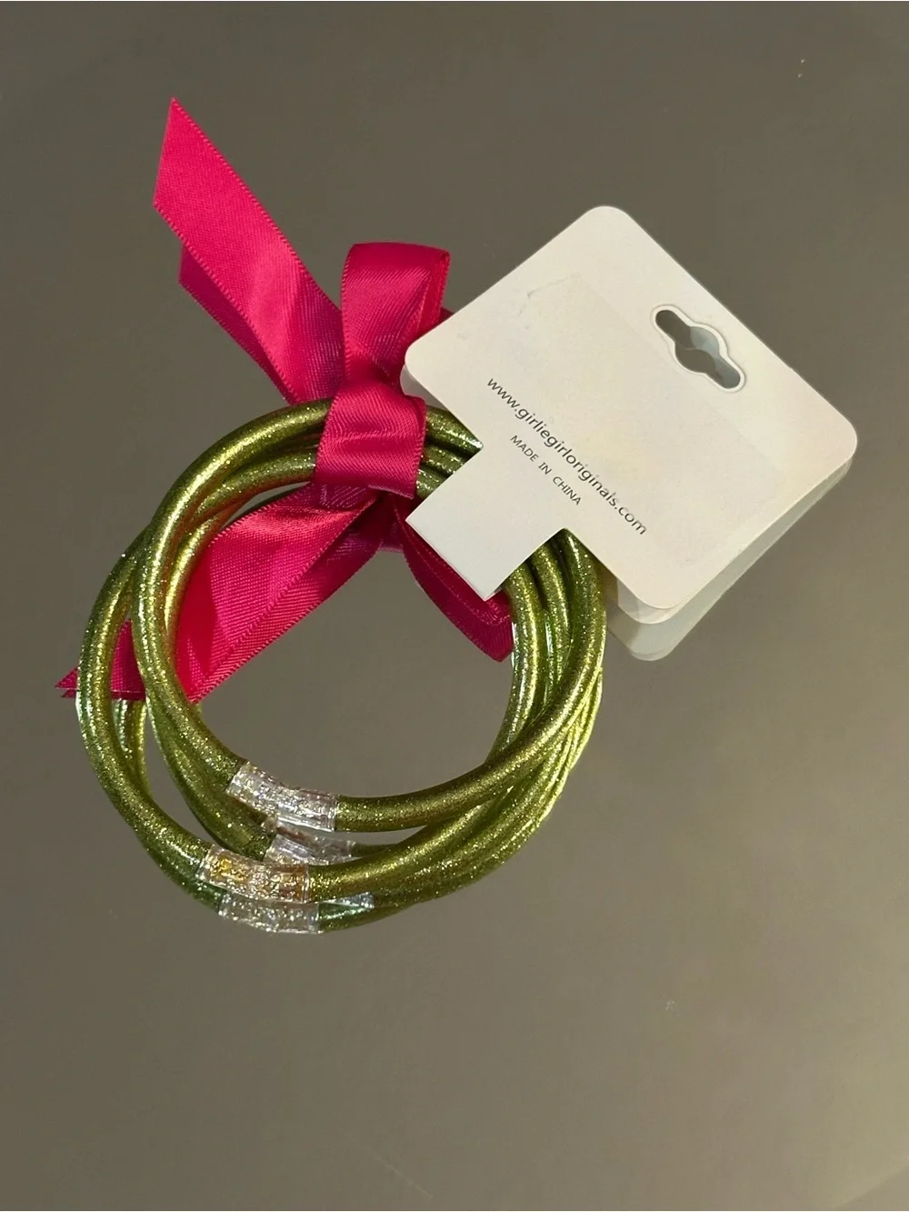 Girlie Girl Originals. 3 Glittery Green Bracelets with Pink Ribbon. (NWT)